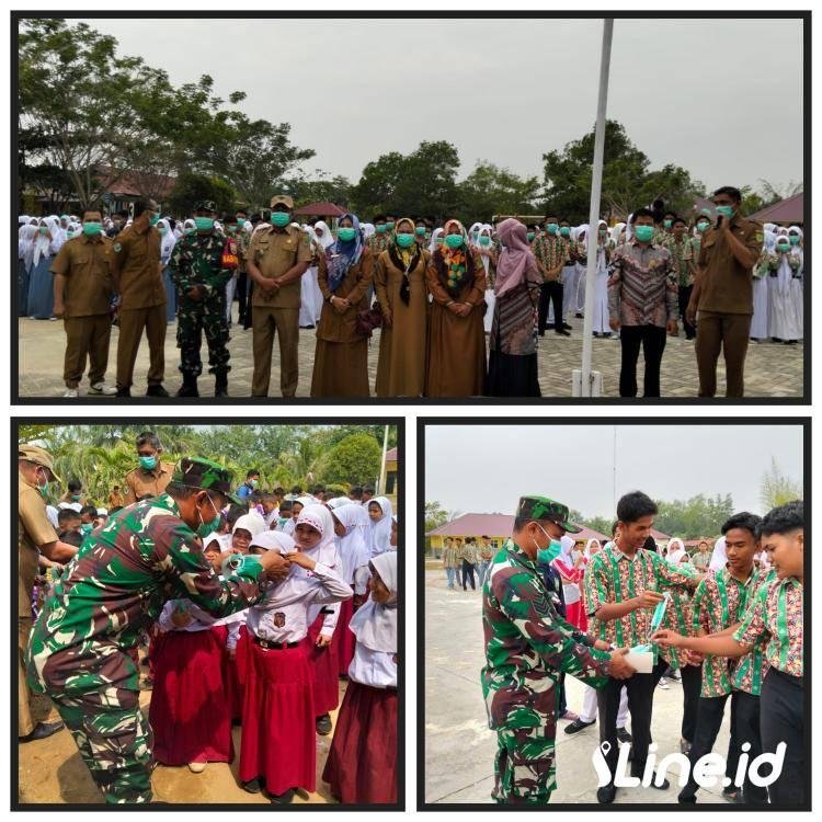 Datangi Tiga Sekolah Yang Ada Dikecamatan Tanjung Medan, Babinsa Koramil 0321-06/TM Bagi Masker Ke Siswa