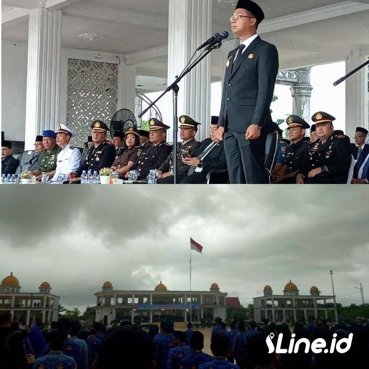 Meski Diguyur Hujan Lebat, Peserta Upacara Hari Kesaktian Pancasila Di Rohil Tetap Tegak Berdiri